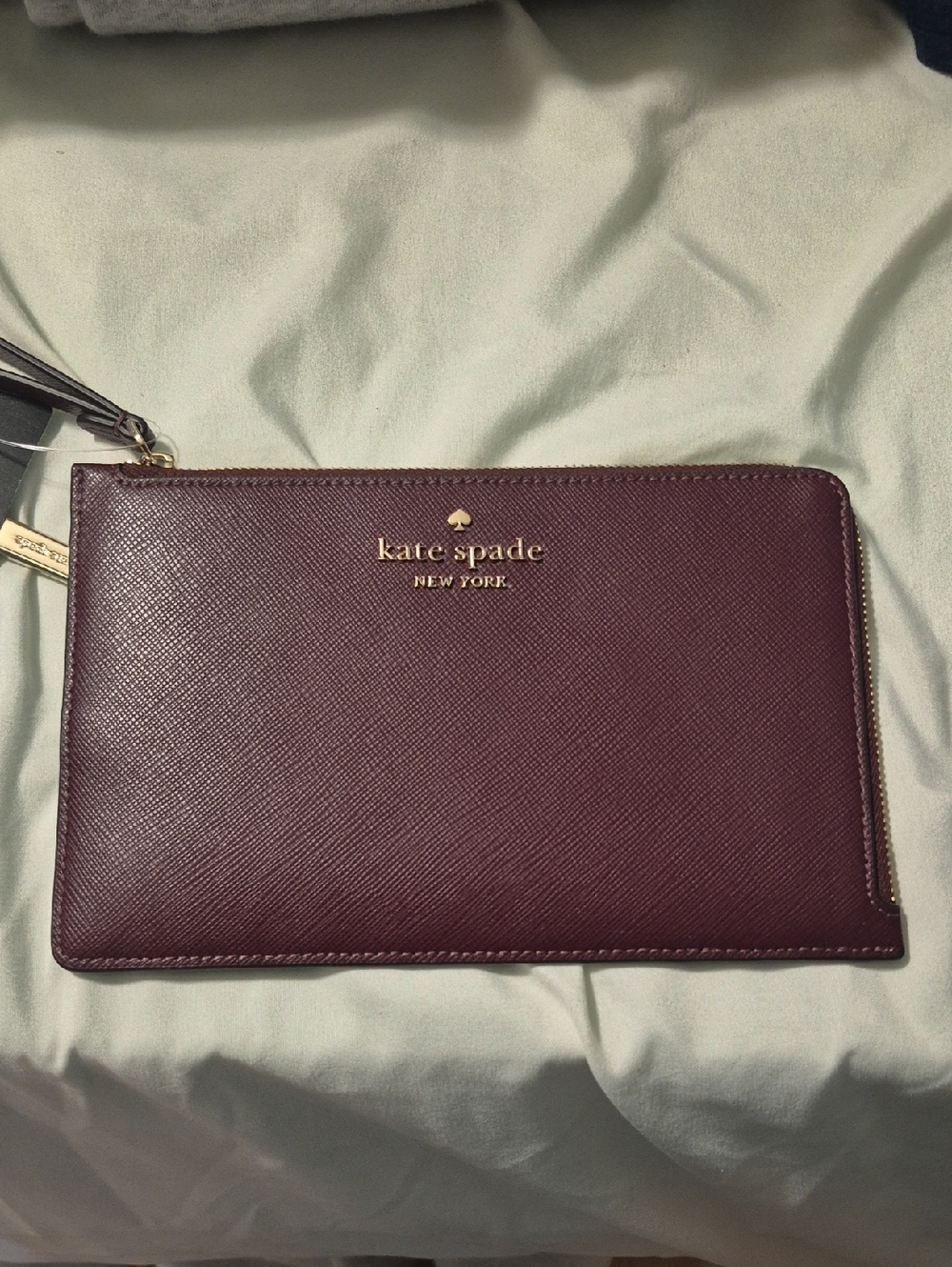kate spade Plum Leather Zip Pouch with Gold Logo